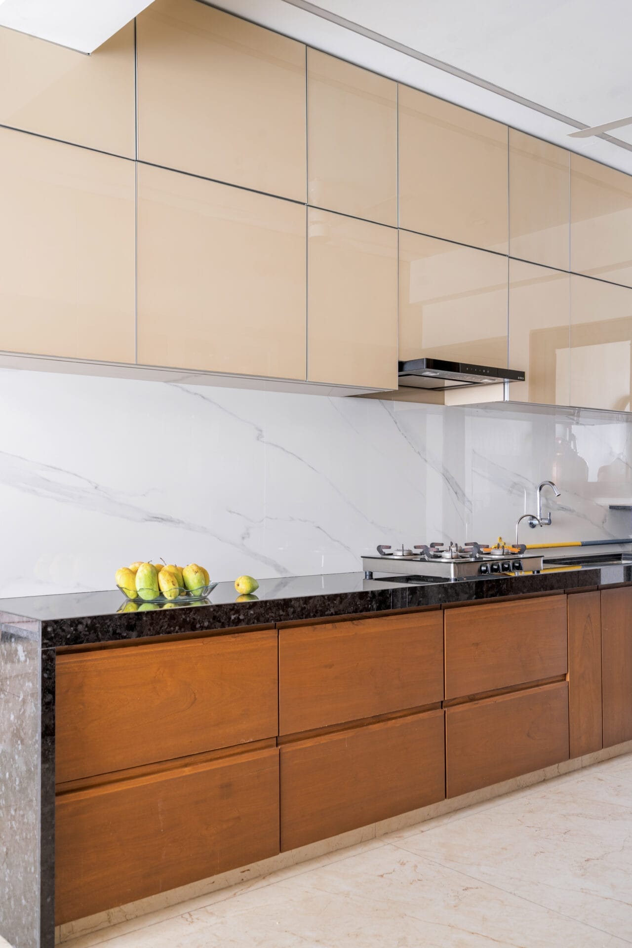 1500 sqft Home in Ahmedabad Seamlessly Marrying Functionality with Aesthetic Appeal 5 8 KITCHEN